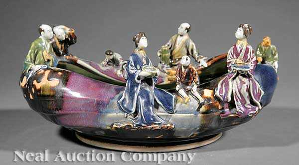 Appraisal: A Japanese Sumida Ware Figural Bowl early th c purple