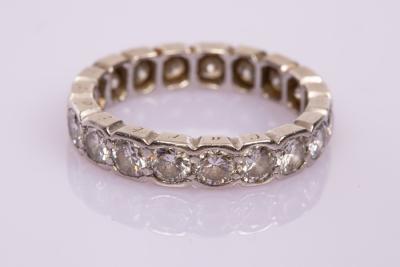 Appraisal: A diamond eternity ring the nineteen stones with total estimated