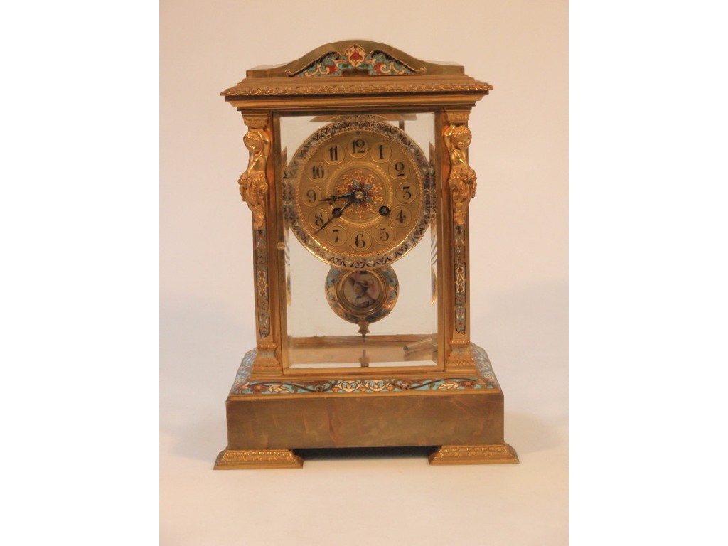 Appraisal: A French Four-Glass Gilt metal Onyx and Champleve Mantel clock