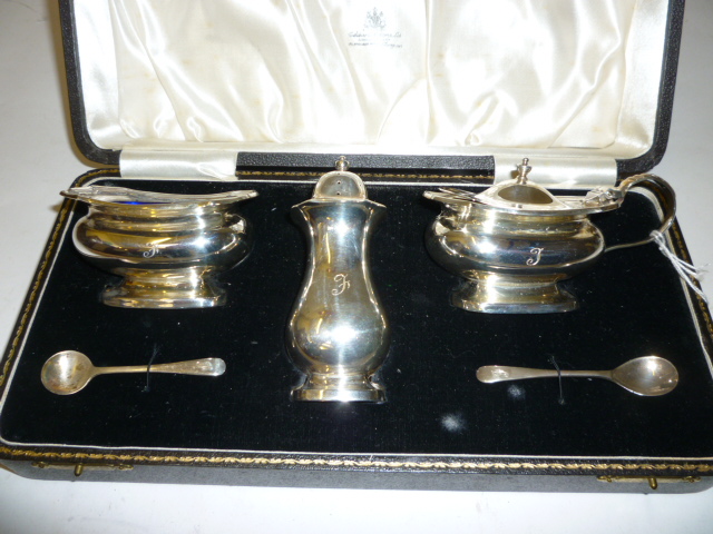 Appraisal: A THREE PIECE CRUET maker Dixons Birmingham of rounded oblong