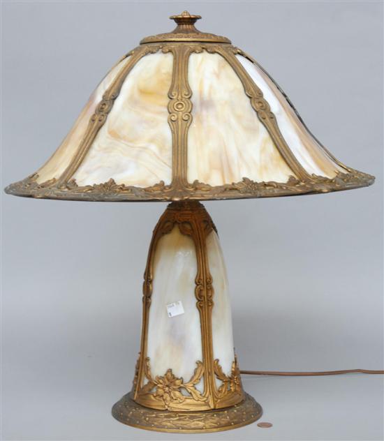 Appraisal: SLAG GLASS TABLE LAMP Having a lighted slag glass base