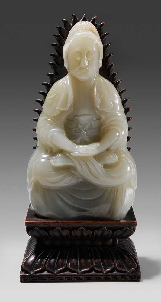 Appraisal: Jade Guanyin Chinese grayish celadon the deity seated in padmasana