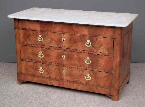 Appraisal: A th Century French figured mahogany commode of Empire design