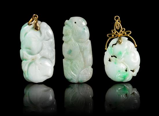 Appraisal: Sale Lot Three Carved Jadeite Pendants each having apple green