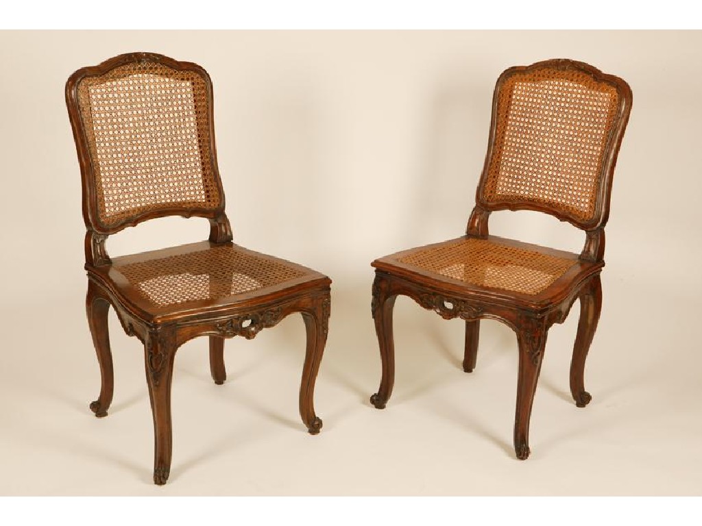 Appraisal: A SET OF EIGHT LOUIS XV PROVINCIAL WALNUT DINING CHAIRS