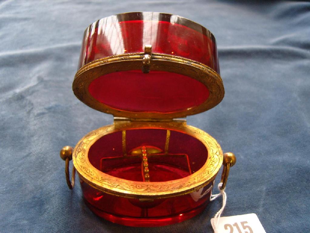 Appraisal: A red glass trinket box of oval form with gilt