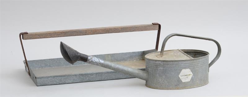 Appraisal: TIN WATERING CAN Together with a wooden-handled tin tray Can