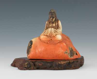 Appraisal: Unusual Carved Coral Buddha The serenely seated figure on a