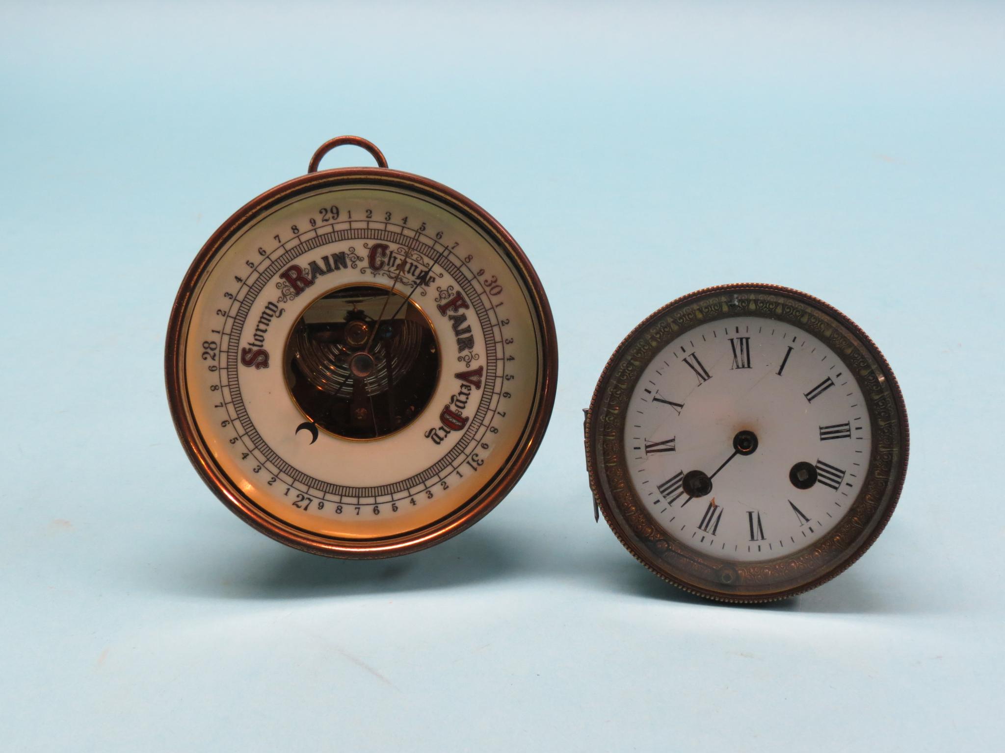 Appraisal: An aneroid barometer enamelled dial and gilt-brass case in together