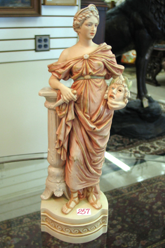 Appraisal: A TEPLITZ AMPHORA BOHEMIAN PAINTED PORCELAIN FIGURE of a young