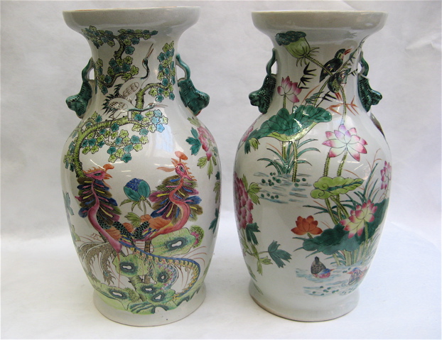 Appraisal: FOUR CHINESE GLAZED POTTERY VASES a pair decorated with colorful