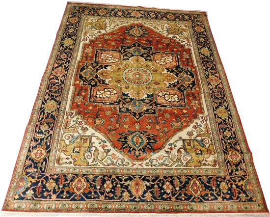 Appraisal: RUG Serapi carpet brick ground wide navy turtle palmette border