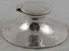 Appraisal: A silver capstan inkwell liner missing by Asprey Birmingham cm