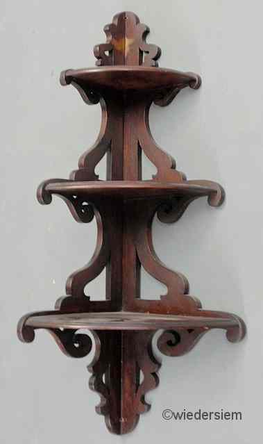 Appraisal: Victorian walnut three-tier what-not corner shelf ''h x ''w x