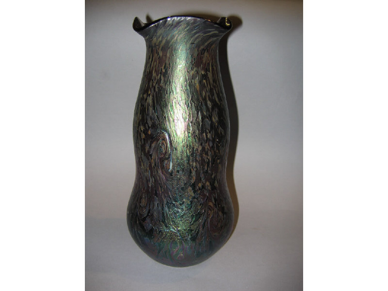 Appraisal: AUSTRIAN ART NOUVEAU VASE green iridescent swirl design on a