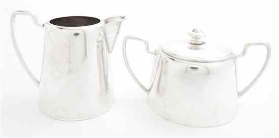 Appraisal: A Peruvian Silver Creamer and Covered Sugar Set Welsch each