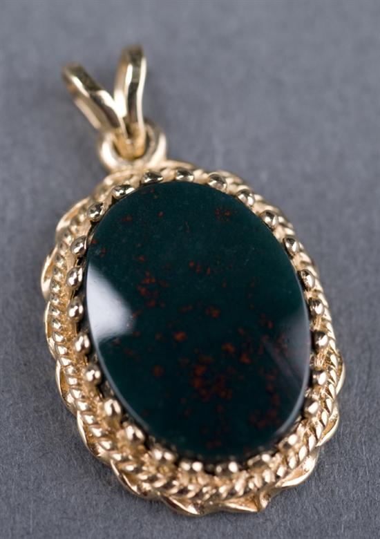 Appraisal: KT yellow gold bloodstone pendant The stone is oval x