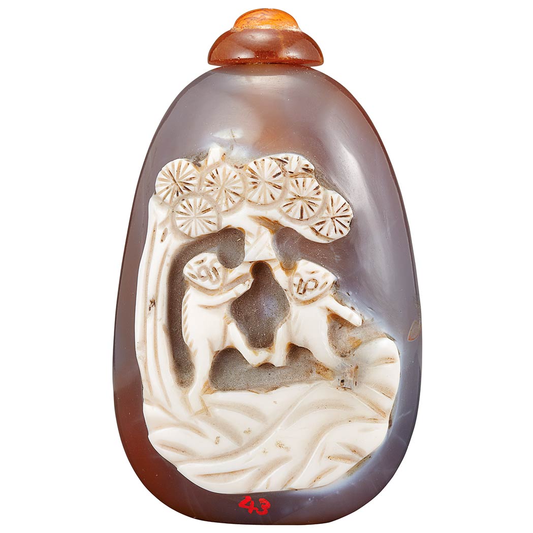 Appraisal: Chinese Carved Agate Snuff Bottle th Century The ovoid shape