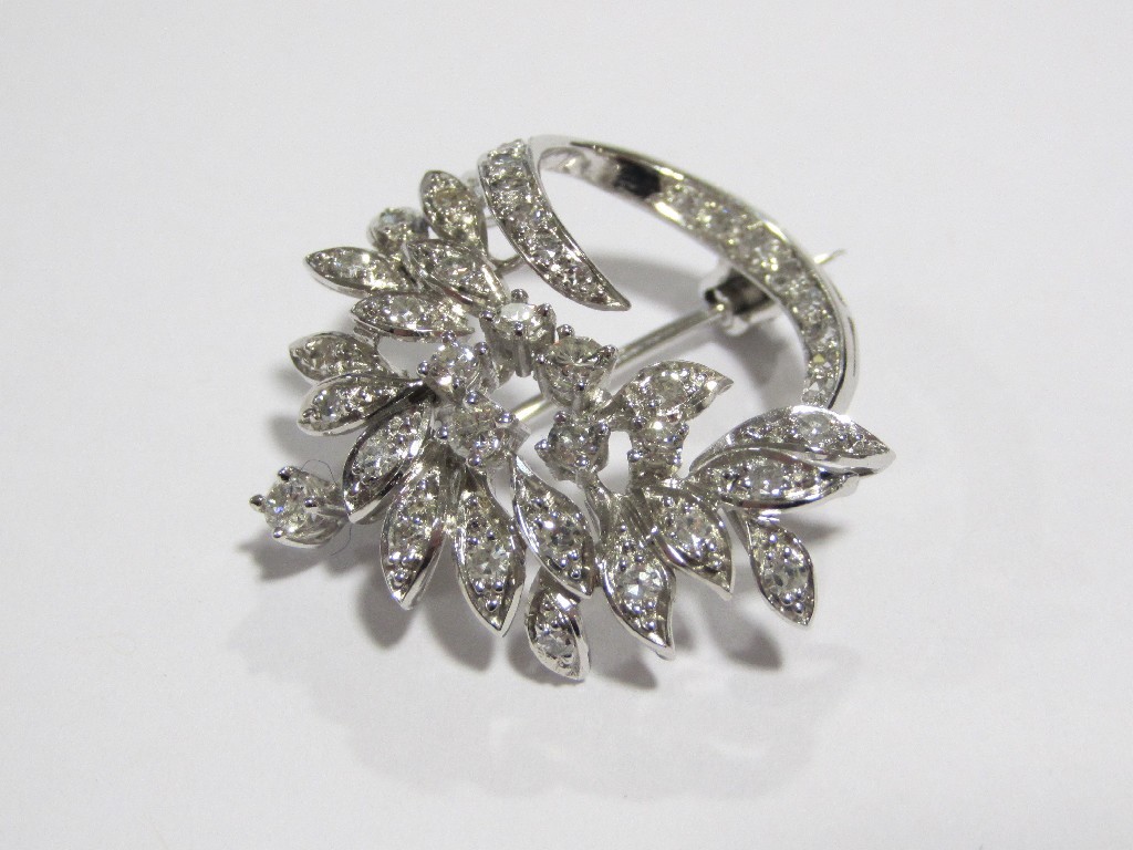 Appraisal: A white metal diamond set spray brooch set throughout with