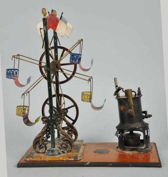 Appraisal: Tin E P Ferris Wheel Steam Operated Toy Description Very