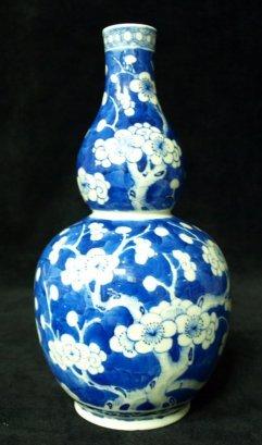 Appraisal: A blue and white double gourd vase decorated throughout with