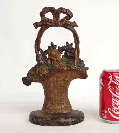 Appraisal: Painted cast iron flower basket doorstop '' Ht