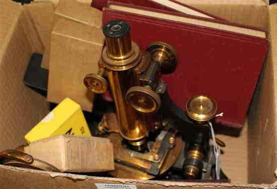 Appraisal: A th century lacquered brass microscope with circular platform un-named