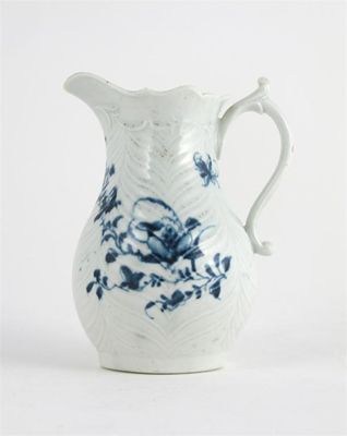 Appraisal: A Worcester blue and white feather moulded jug painted with