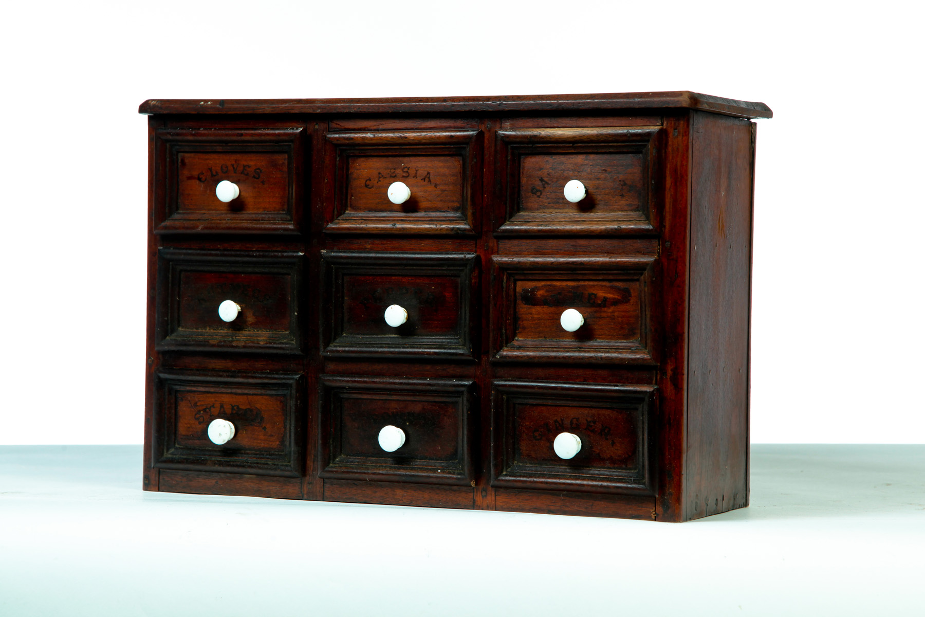 Appraisal: NINE-DRAWER SPICE CABINET America rd quarter- th century walnut with