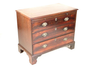 Appraisal: A mahogany chest th century the brushing slide and three