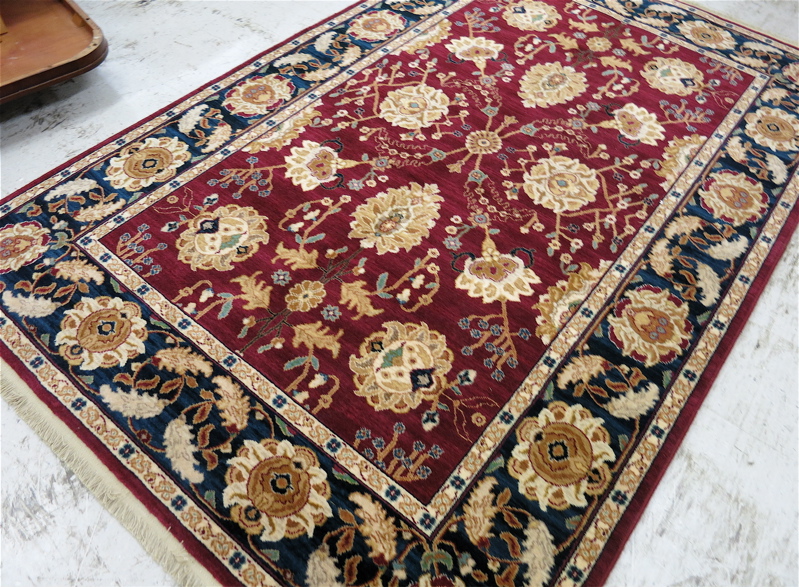 Appraisal: KARASTAN AMERICAN ORIENTAL CARPET Agra pattern on red ground machine