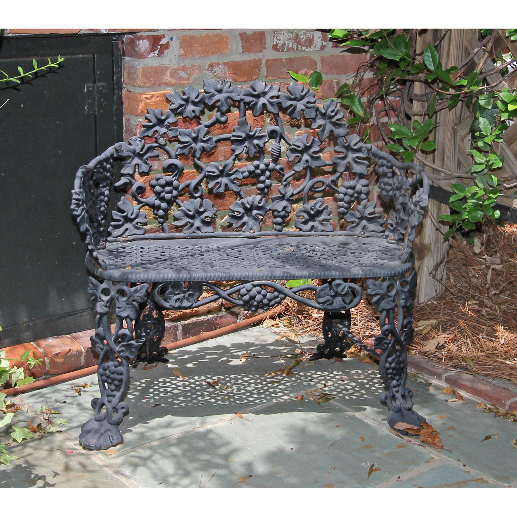 Appraisal: Victorian Style Diminutive Garden Bench th century cast iron grape