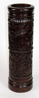 Appraisal: Heavily carved mahogany umbrella stand Heavily carved mahogany umbrella stand