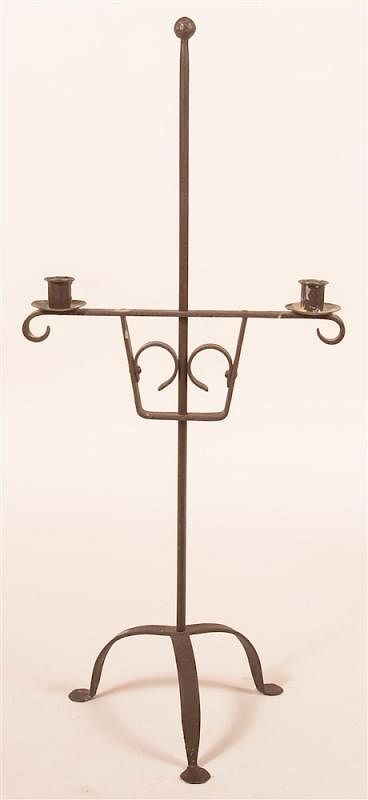 Appraisal: Wrought Iron Adjustable Candle Stand th th Century Wrought Iron