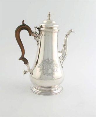 Appraisal: A George II baluster coffee pot on a spreading circular