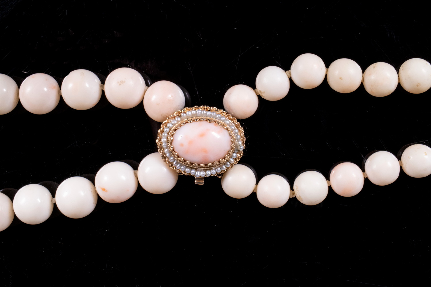 Appraisal: ANGEL SKIN CORAL BEAD NECKLACE WITH K GOLD CLASP Double