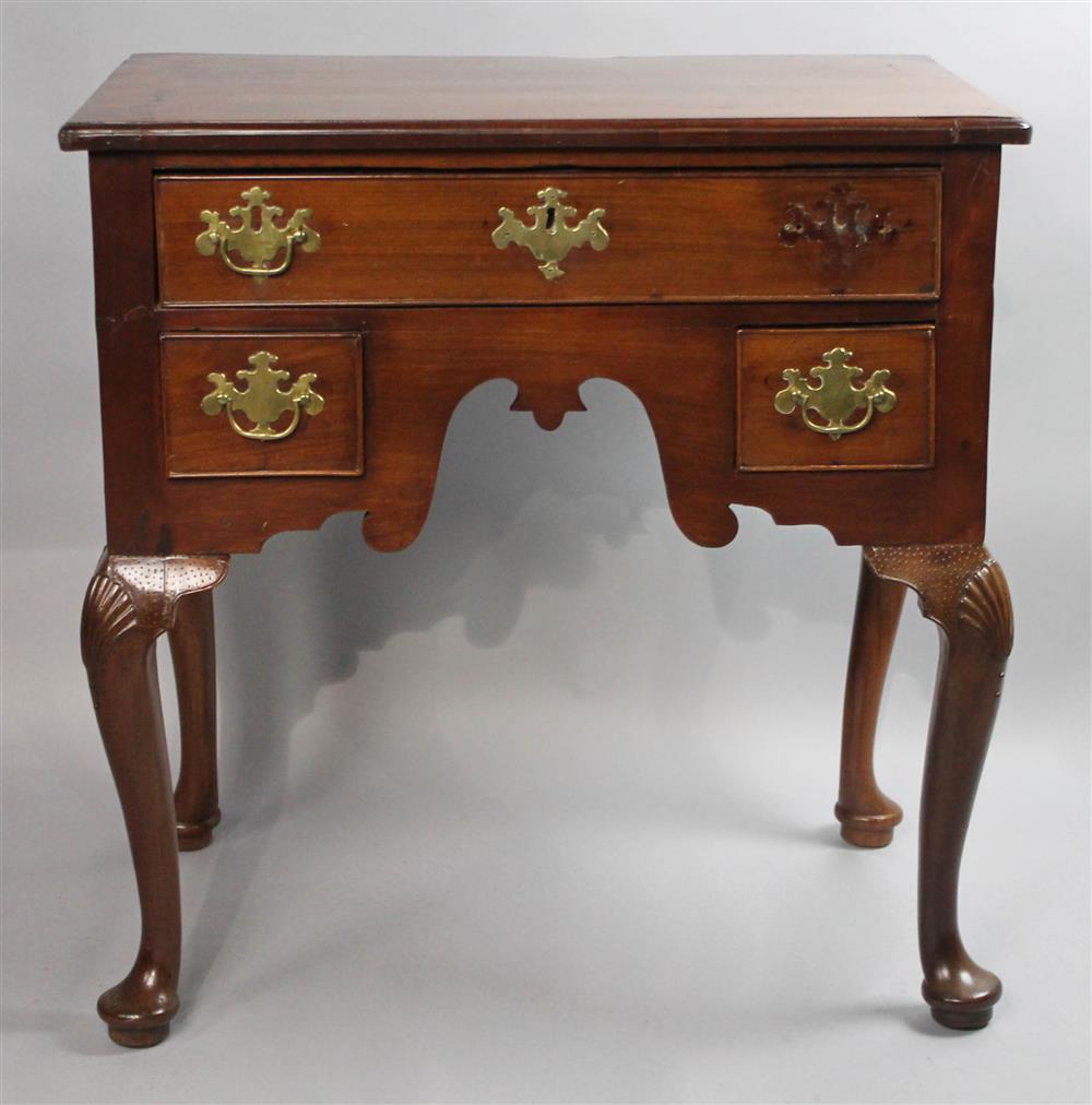 Appraisal: GEORGIAN MAHOGANY LOWBOY having a rectangular top with molded edges