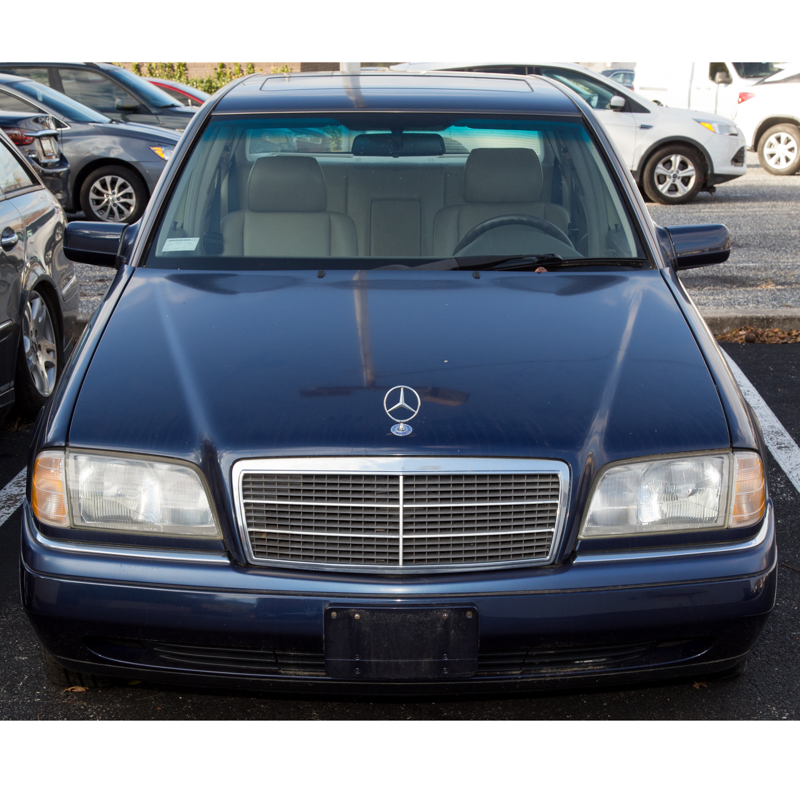 Appraisal: MERCEDES BENZ C SEDAN Four-door sedan navy exterior beige interior