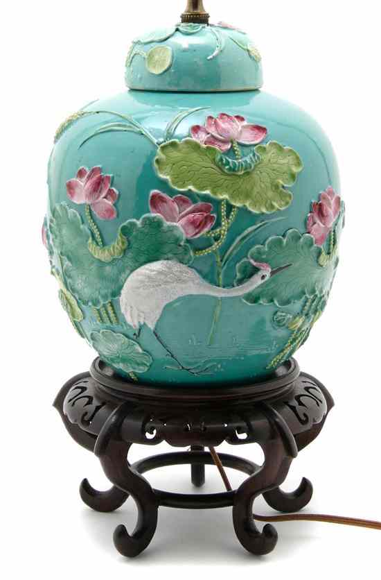 Appraisal: A Chinese Ginger Jar having applied decoration of lotus flowers