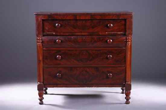 Appraisal: AMERICAN EMPIRE FLAME MAHOGANY CHEST-OF-DRAWERS Circa Four full-width drawers centered