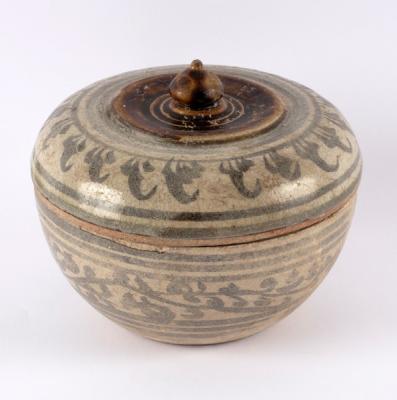 Appraisal: A Persian pottery bowl and cover with foliate and stylised