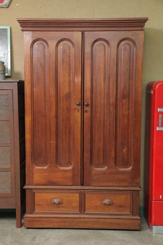 Appraisal: WARDROBE Three part walnut wardobe with step molded cornice double