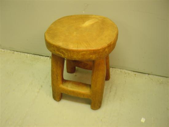 Appraisal: Solid elm stool carved out of a single piece of