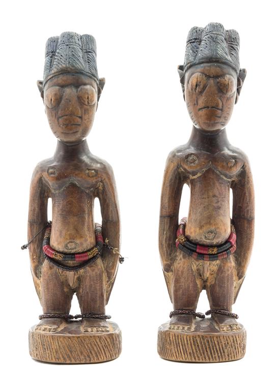 Appraisal: Sale Lot Two Yoruba Carved Ibeji Figures each depicted standing