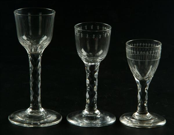 Appraisal: A facet-stemmed wine glass the ogee bowl with petal-cut lower