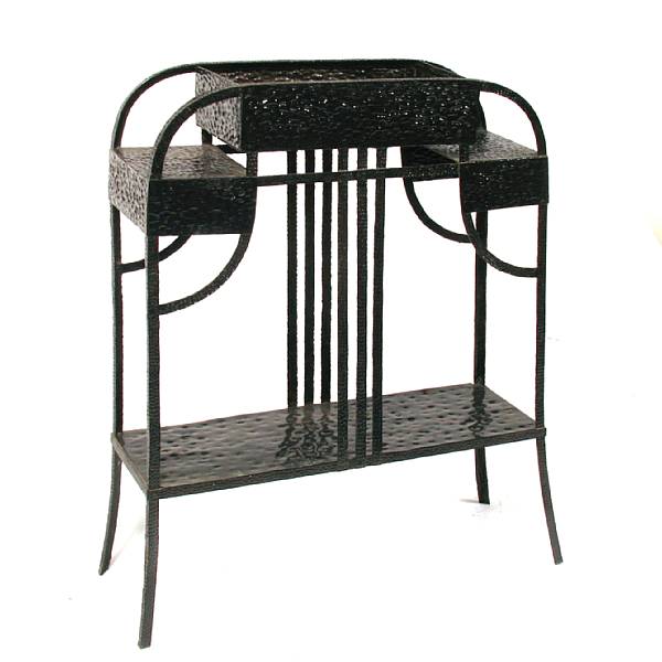 Appraisal: A Secessionist black-painted hammerred metal plant stand height in width