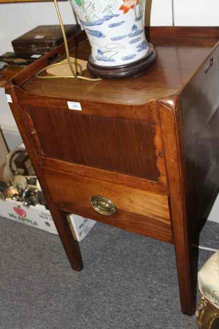 Appraisal: A GEORGIAN MAHOGANY NIGHTSTAND of square cut form fitted with