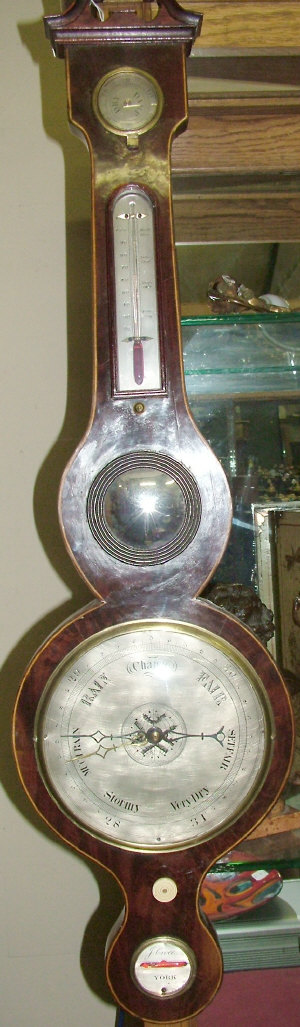 Appraisal: An early th century line inlaid mahogany cased wheel barometer