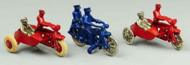 Appraisal: THREE HUBLEY TOY MOTORCYCLES Cast iron lot includes blue ''COP''