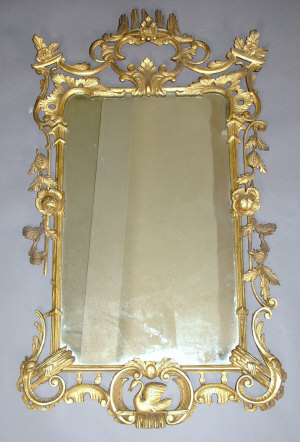 Appraisal: A Chippendale style giltwood and pierced rectangular wall mirror th